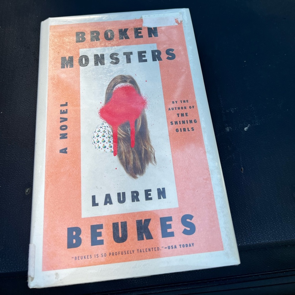 Broken Monsters by Lauren Beukes - Coral & White Hardcover